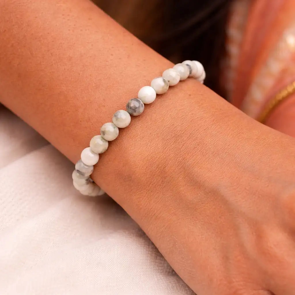 Person Wearing Moonstone Bracelet
