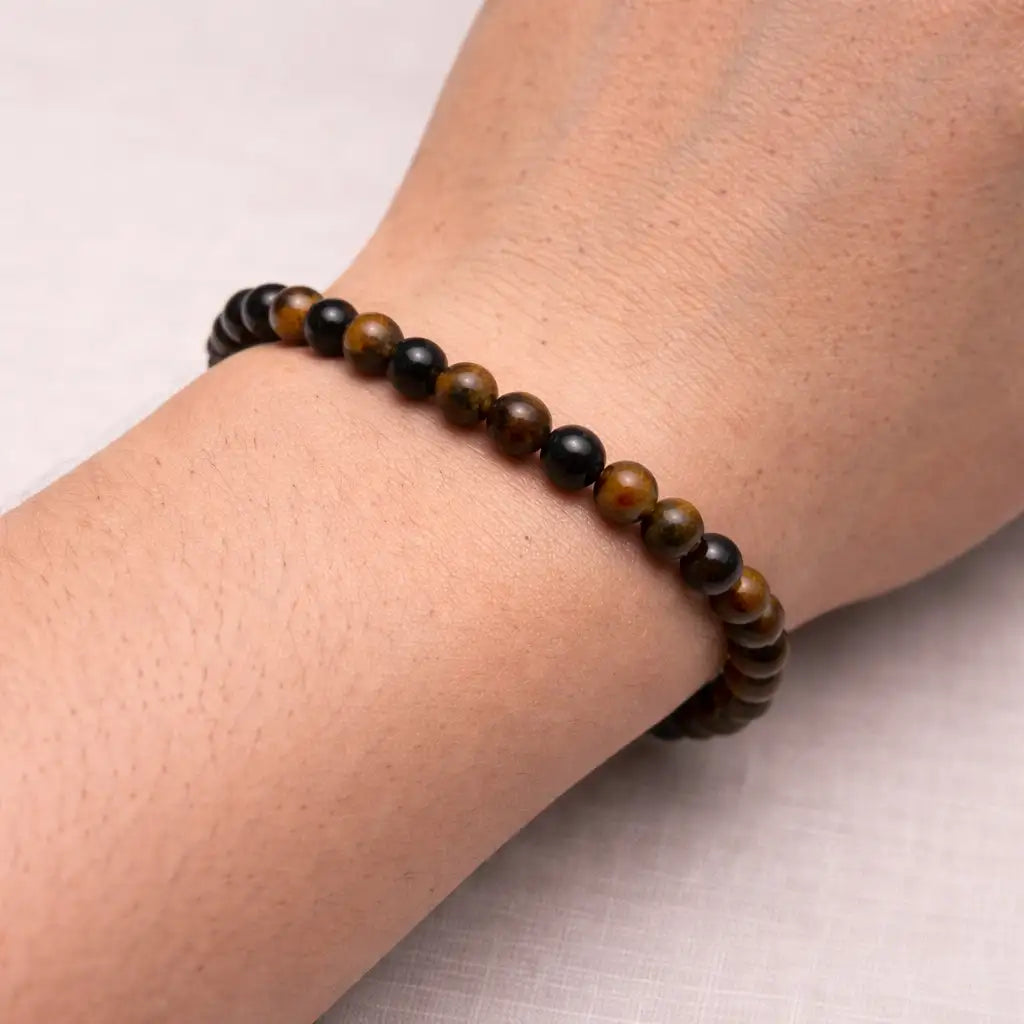Person Wearing Tiger's Eye Bracelet